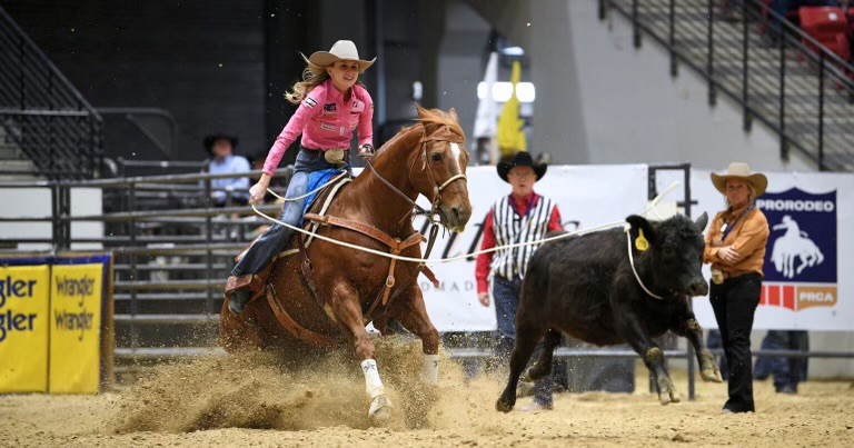 Josie Conner with horse dutch at rodeo