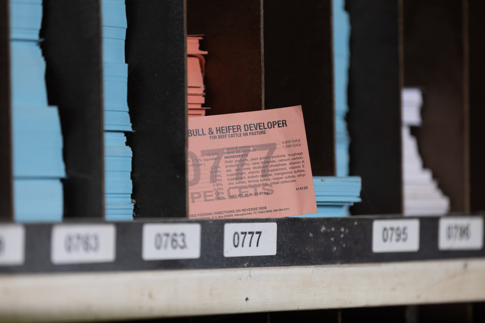 product breakdown sheet sticking out of a cubby